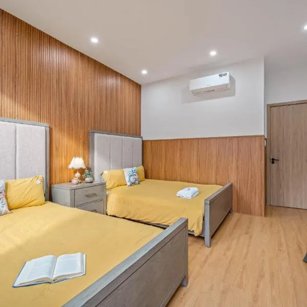 Nguyên căn 4 giường YA Beach Da Nang, hotel v destinaci Danang