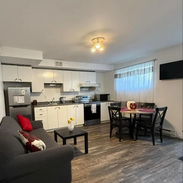 Charmant appartement au sous-sol, hôtel à Longueuil