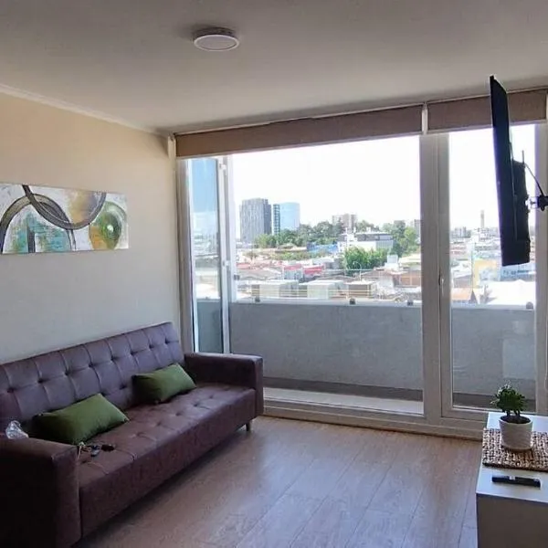 departamento céntrico amplio y cómodo, hotel in Chillán