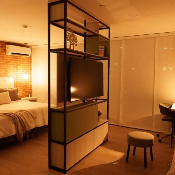 NEW in laurels with air , loft type, giant tv, hotel in Medellín