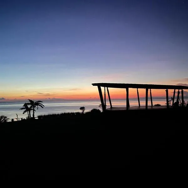 9 huts on a hill, hotel in Kudat