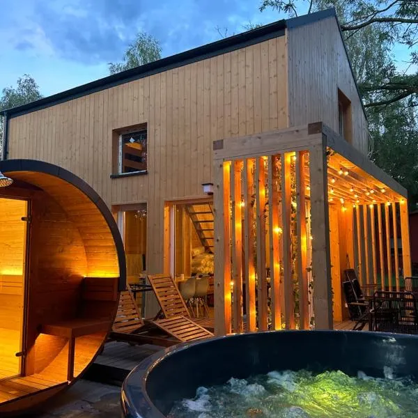 Sauna&Jacuzzi Domki Pod Brzozami Sława, Hotel in Sława