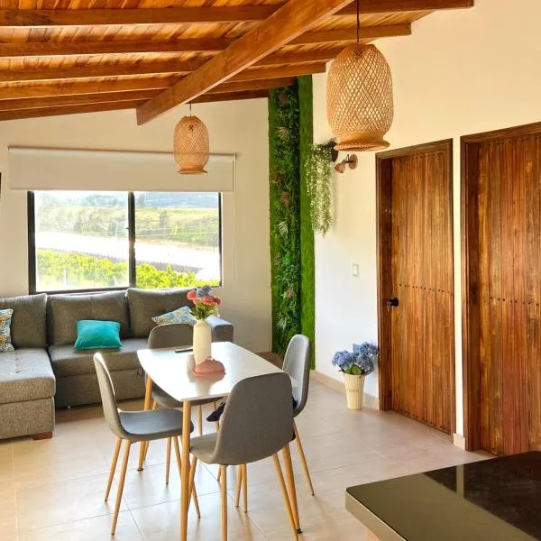 Cabaña rodeada de frutales - Granja la miel, hotel v destinaci Corrales