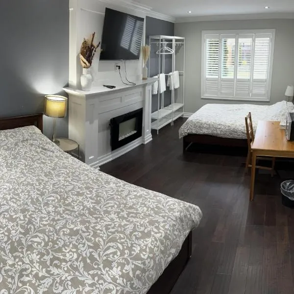 F3 Spacious room with 2 queen beds and TV, hotel in Mississauga