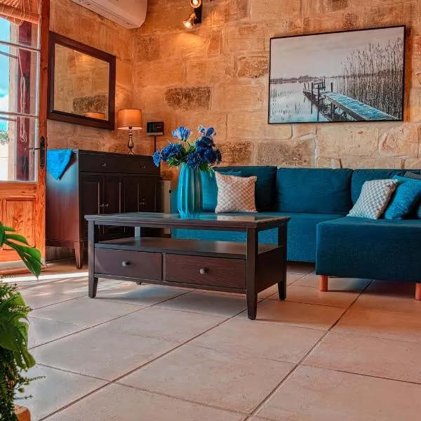 Farmhouse Cala, hotel i Qala