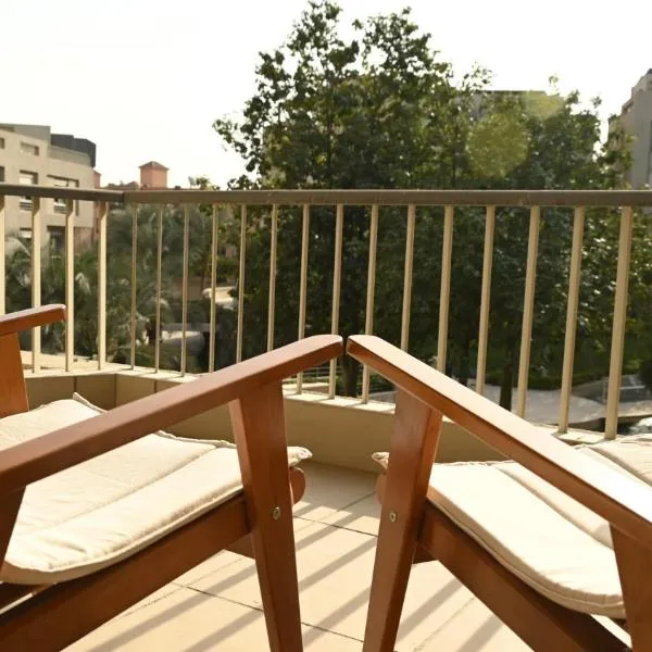 Pyramids Escape, hotel em Kafr Ghaţāţī