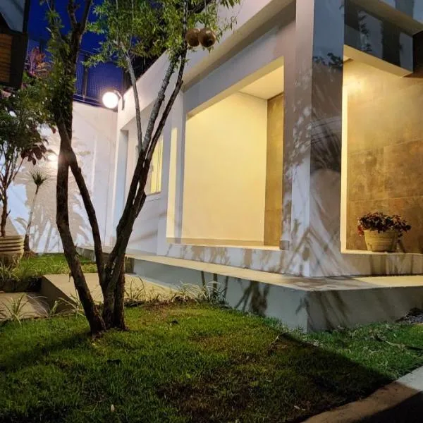 Casa aconchegante e tranquila no centro da cidade, hotel in Passa Quatro