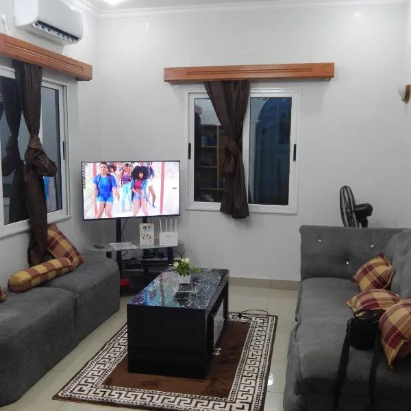 Nzing Apartments, хотел в Бразавил