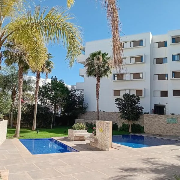 AgadirBay IkenParc centre piscine , et plage à 5mnts à pieds, hotel in Agadir