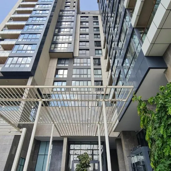 Axxodia- Apartments In Aeon Towers, Hotel in Sheikh Zayed