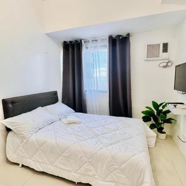 New Condo at Grand Riviera Suites across US Embassy, hotel in Manila