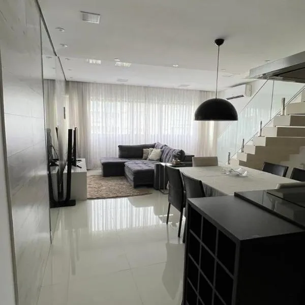 Apto Guaruja, hotel in Guarujá