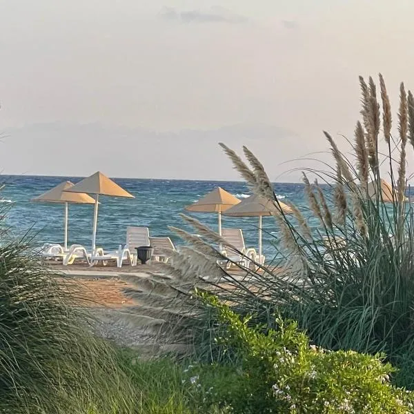 Tranquil Suites By the Sea, hotel a Vokolidha