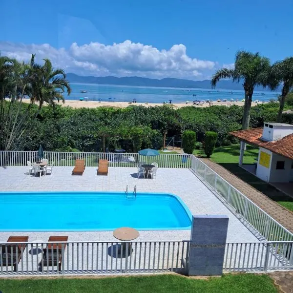 Apartamento de 1 dormitório com vista para Piscina, Praia ou vista lateral Pontas das Canas, hotel in Florianópolis