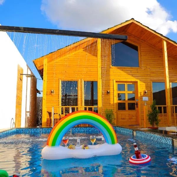 أكواخ الردسي, hotel in Al Kura