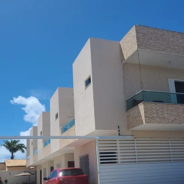 Casa 3 quartos 2 suítes na praia a 2km da Atalaia، فندق في أراكاجو