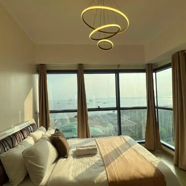 2BR Grand Riviera Suites by MrSayla, hotel in Manila