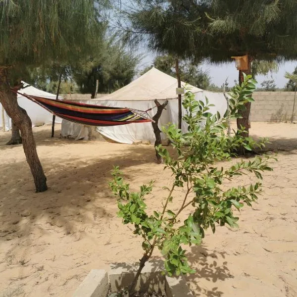 Les jardins fleuris de lompoul sur mer, hotel en Tioukougne Peul