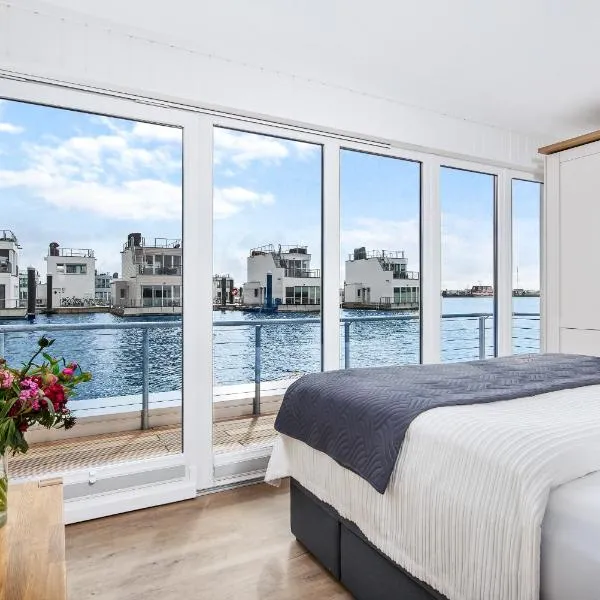 5 Beaufort - Wasserhaus, Meerblick, Sauna, Dachterrasse, Bootsanleger, Strandkorb, hotel a Olpenitz