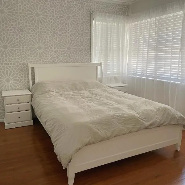 Living Oasis Home, hotel i Auckland