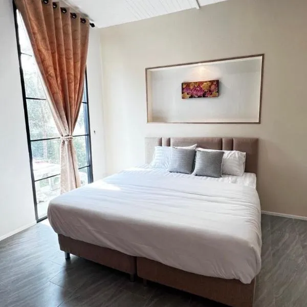 บ้านต้นลมสุวรรณภูมิ Baantonlom suvarnabhumi, hotel in Ban Khlong Thewa