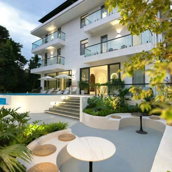 Xishuangbanna Verdant House Resort Hotel, hôtel à Jinghong