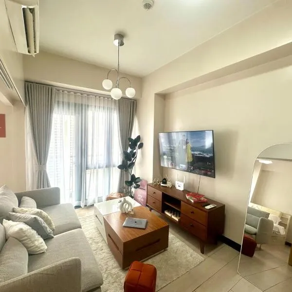 Cozy 1BR at Greenbelt Hamilton Makati, ξενοδοχείο στη Μανίλα