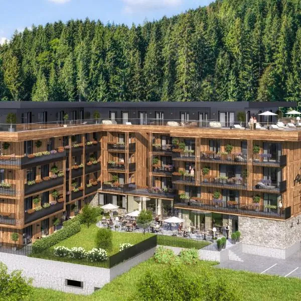 AlpenParks Hotel & Apartment Taxacher, hotel a Kirchberg in Tirol