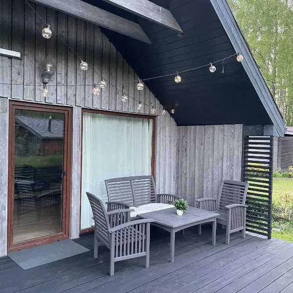 Sea Side house (70m2) Lejas Ziediņi, хотел в Plieņciems
