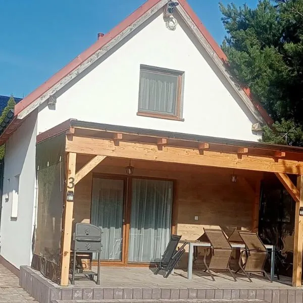 Domki u Eweli CAŁOROCZNE ogrzewane kominkiem, hotel v destinaci Stegna