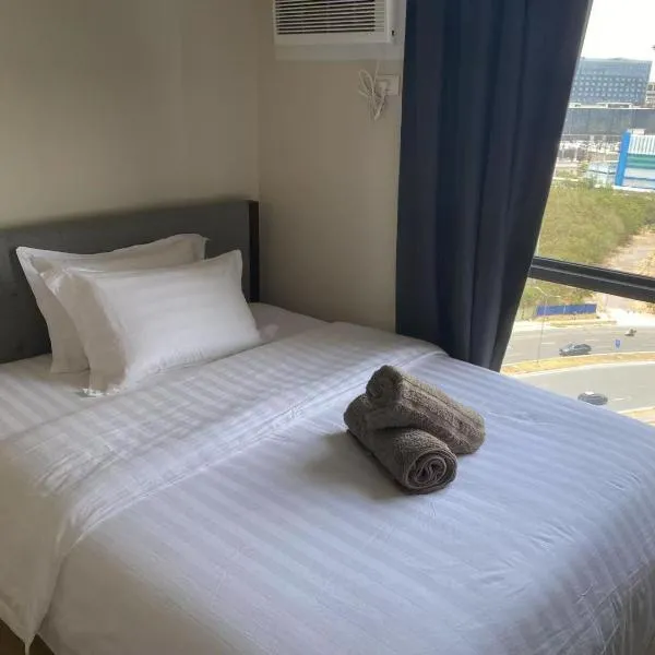 1BR 2 mins to Okada near MOA & Airport-12C, hotel u Manili
