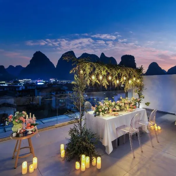 Yangshuo QingQing Riverside Inn, ξενοδοχείο σε Yangshuo