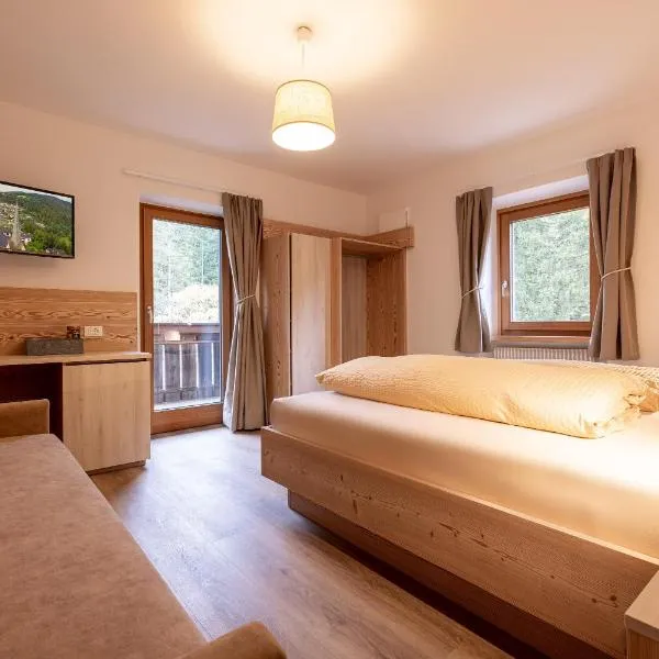 SAN PIETRO DOLOMITI Small Budget Hotel, готель в Ортізеї