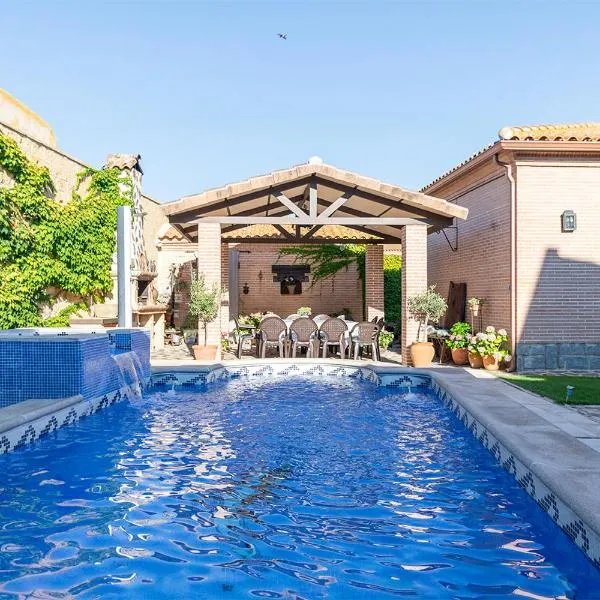 La Casa de las Flores Casa Rural، فندق في Pulgar