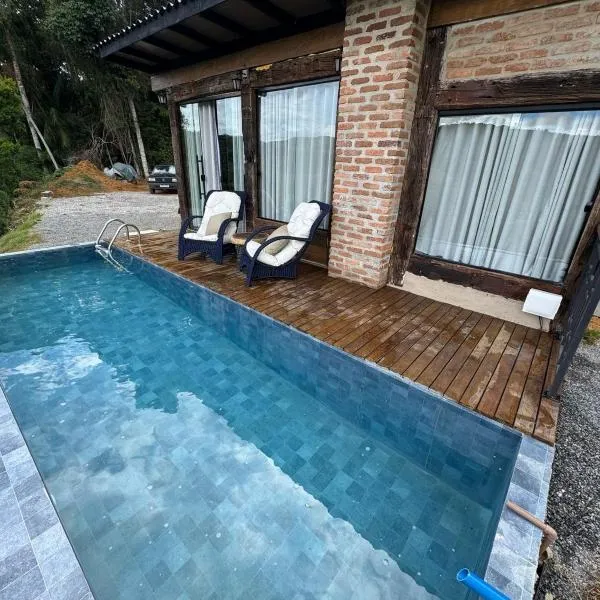 Cabana Herança do Vovô, отель в городе Домингус-Мартинс