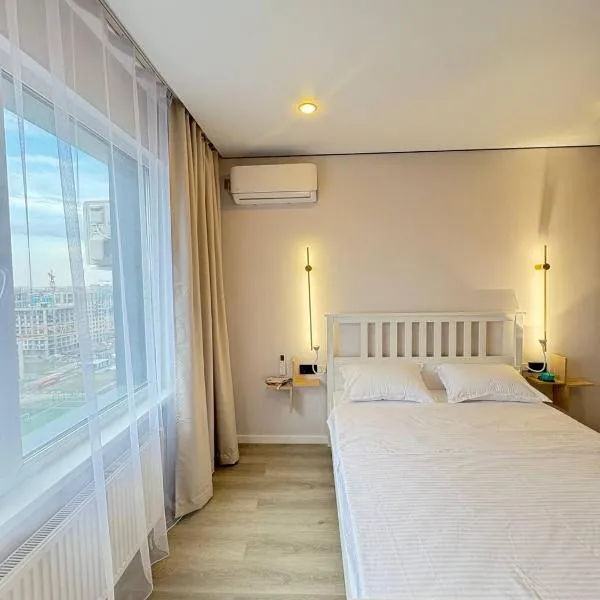 Апартаменты в 10 минутах от аэропорта Apartments 10 minutes from the airport, hotel v destinaci Astana