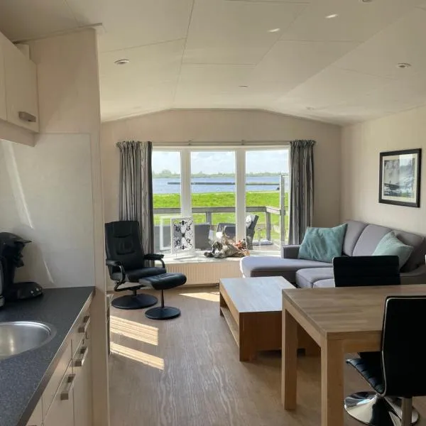 Haus mit dem schönsten Blick direkt am Meer BEST VIEW, Hotel in Lauwersoog