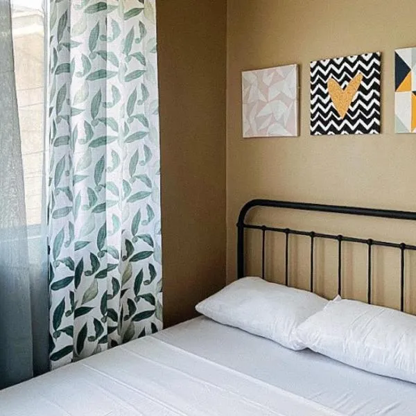 RedDoorz at Aurea Apartelle, מלון באילואילו סיטי