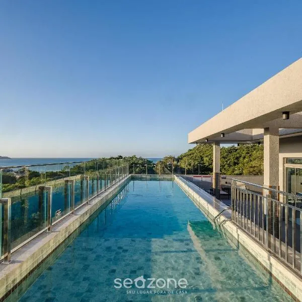 Sua estadia exclusiva com piscinas e jacuzzi a 500m da praia - ELF, hotel a Bombas