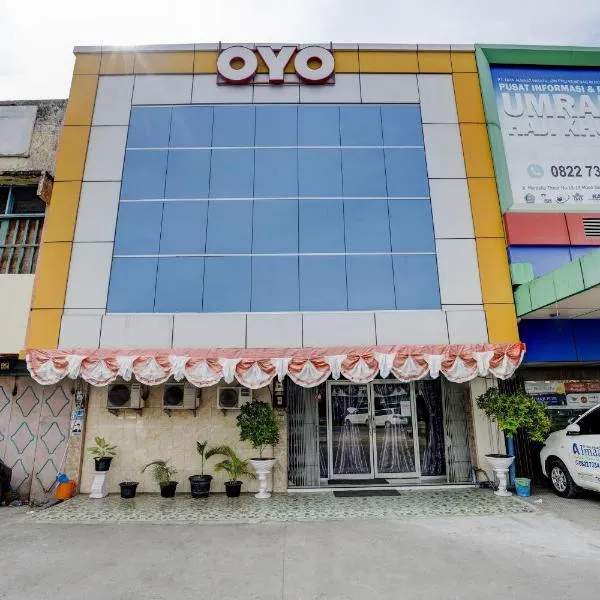 Lhokseumawe에 위치한 호텔 Hotel O Wisma Sartika