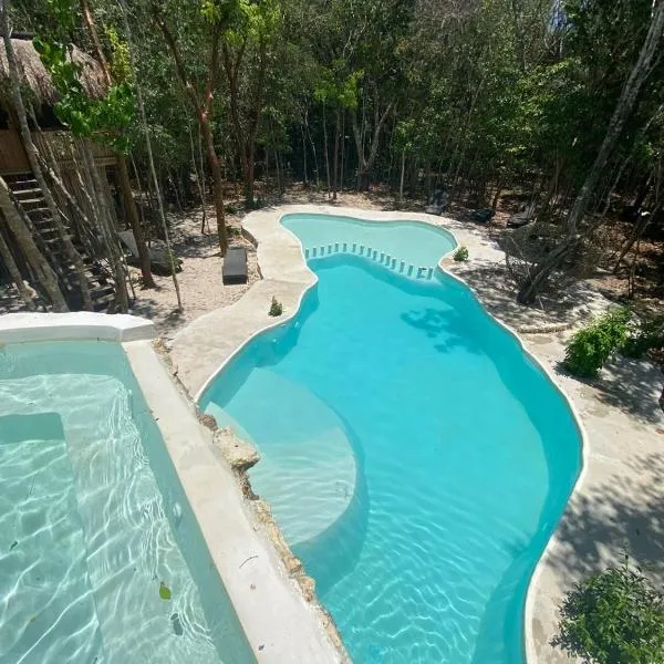 Aldea Maya-Ha Cabañas con cenotes, hotel in Puerto Morelos