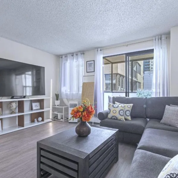 Cozy & Spacious 2BR at Stampede w Parking and AC, hotel v destinaci Calgary