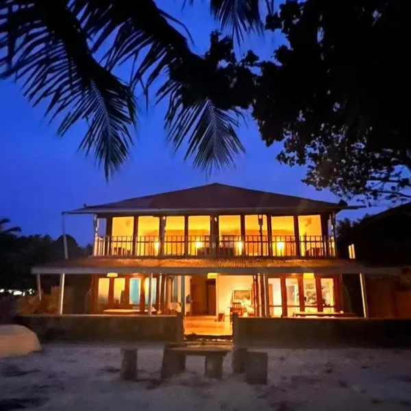 Twin Palms Villa and Homestay, hotel en Tuapejat