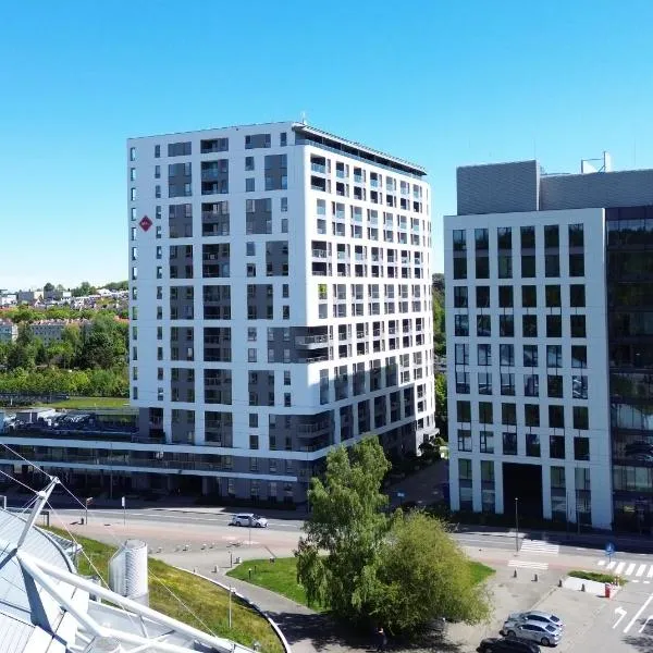 Apartment Efaga Modern Tower Gdynia with Private Parking Space, hotel in Gdynia