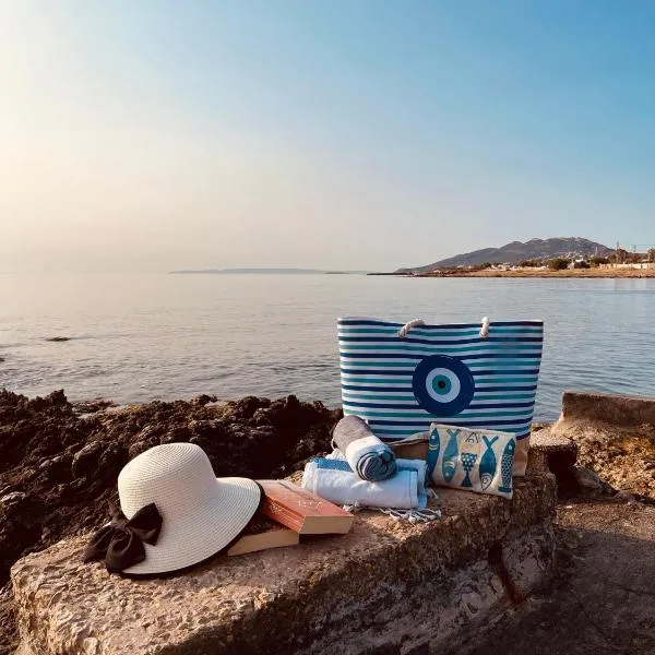 Airport Cottage House, хотел в Артемида