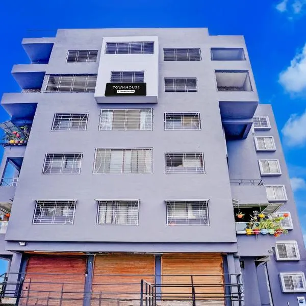 Super Townhouse Godavari Riverbank Formerly Shanti Datta Inn، فندق في ناشيك