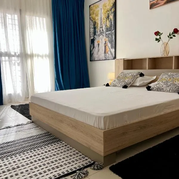 Chambre dhôte avec salle de bain privée À deux pas de la plage pour un séjour chaleureux, hotel v destinaci Dakar