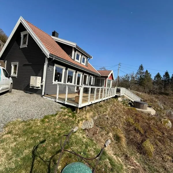 Landlig hytte med jacuzzi, ξενοδοχείο σε Lyngdal