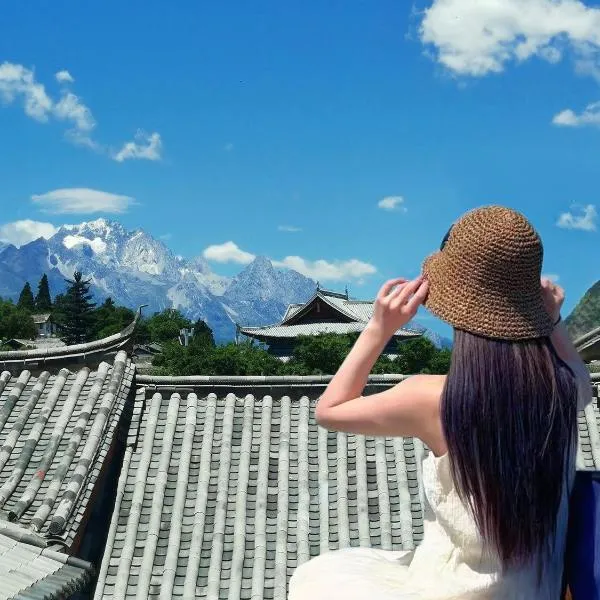 Yiyuan Snow Mountain View Naxi Style Inn- Lijiang Old Town Mufu branch, hotel v destinaci Li-ťiang