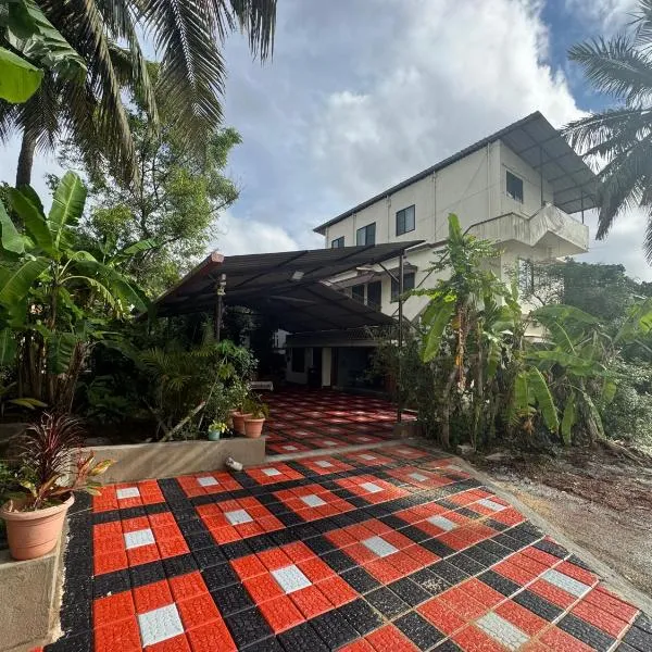 KENSON'S INN, מלון במנגלור